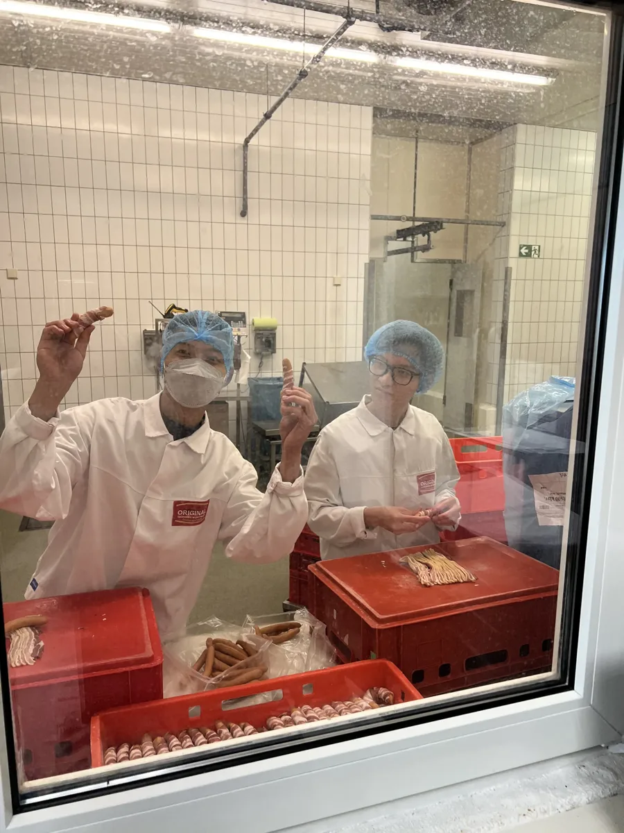 Skilled workers at a partner company in food production
